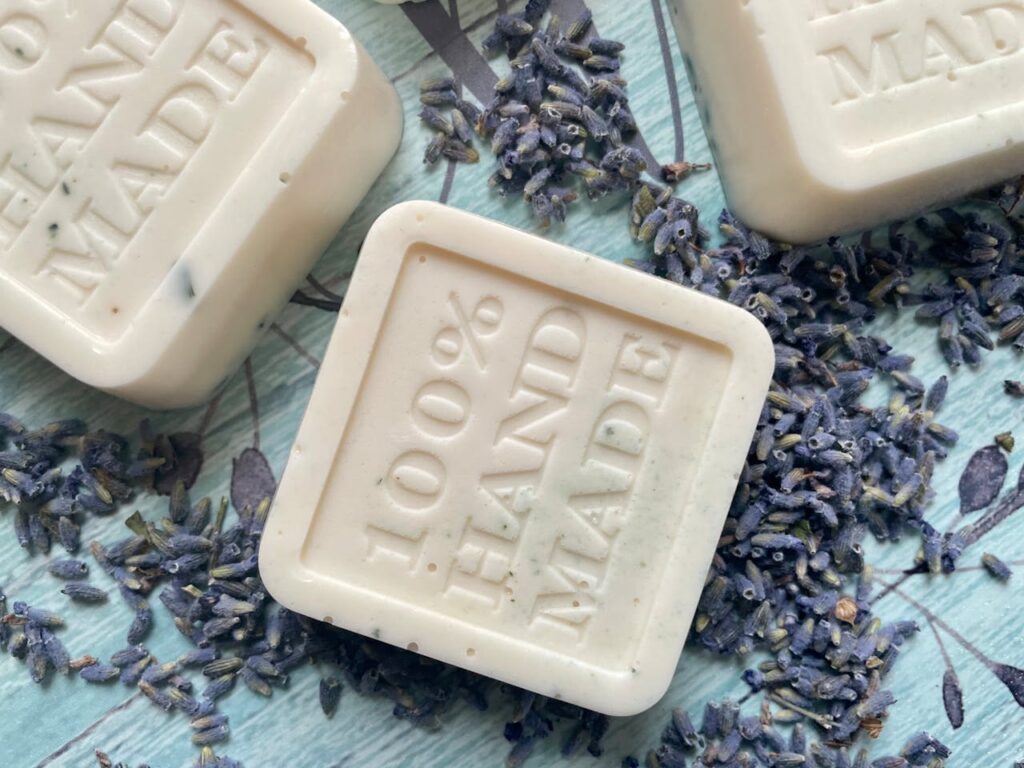 Close-up of handmade organic soap with lavender accents, perfect for natural skincare.
