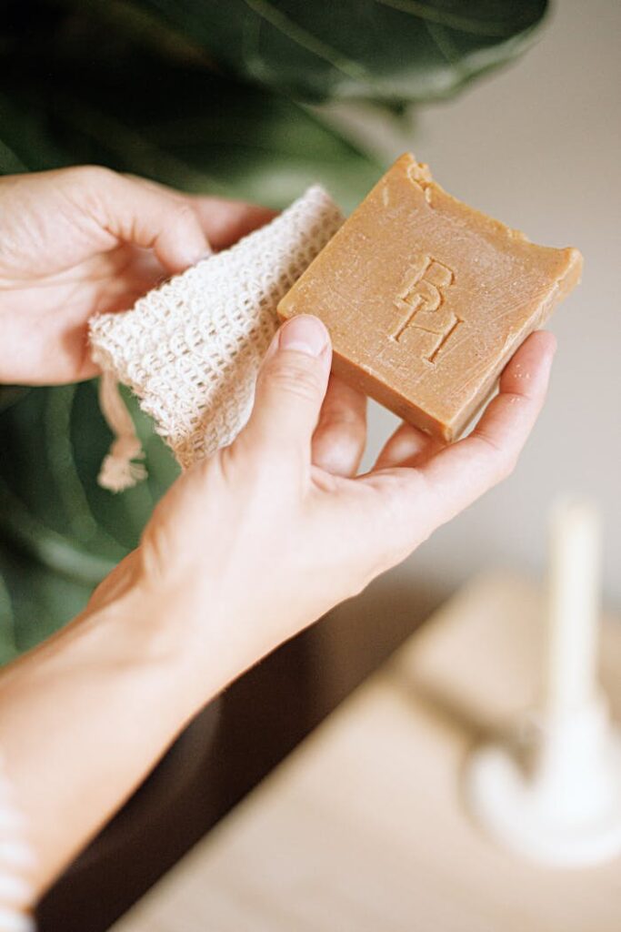 Elegant handmade soap bar displayed with minimal packaging, showcasing natural beauty in neutral tones.