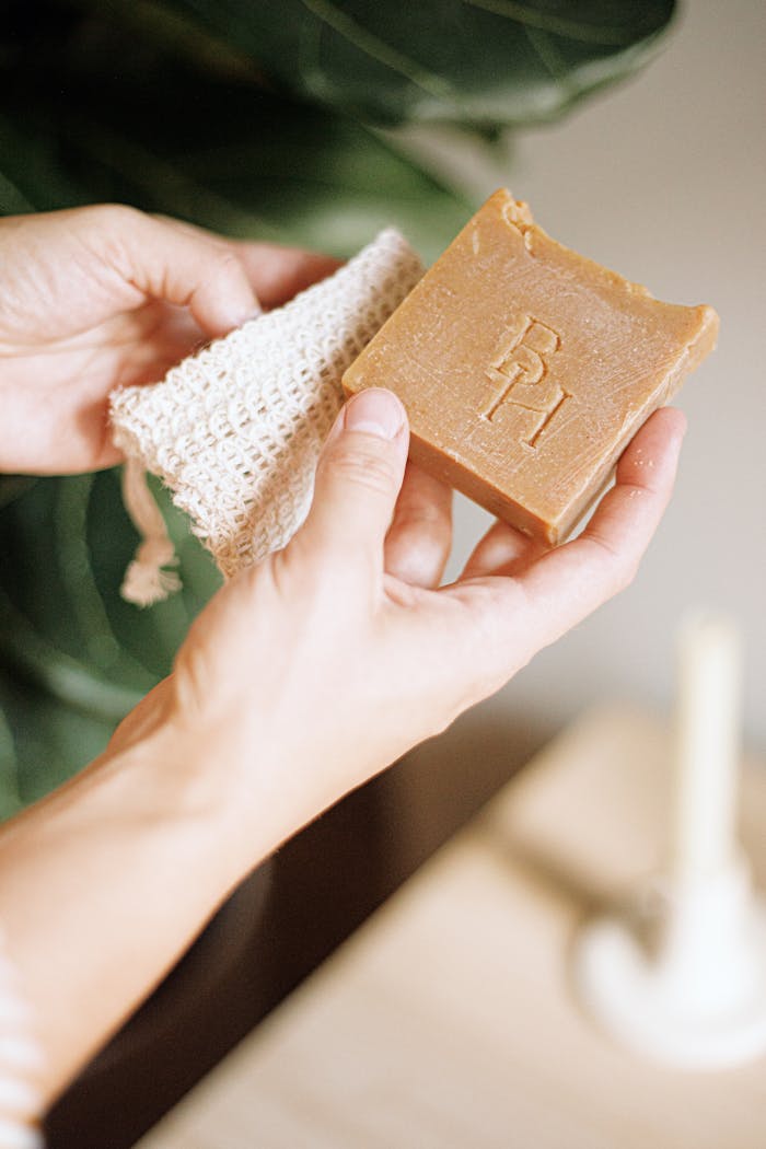 Elegant handmade soap bar displayed with minimal packaging, showcasing natural beauty in neutral tones.